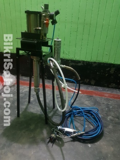 Spray painting machine .